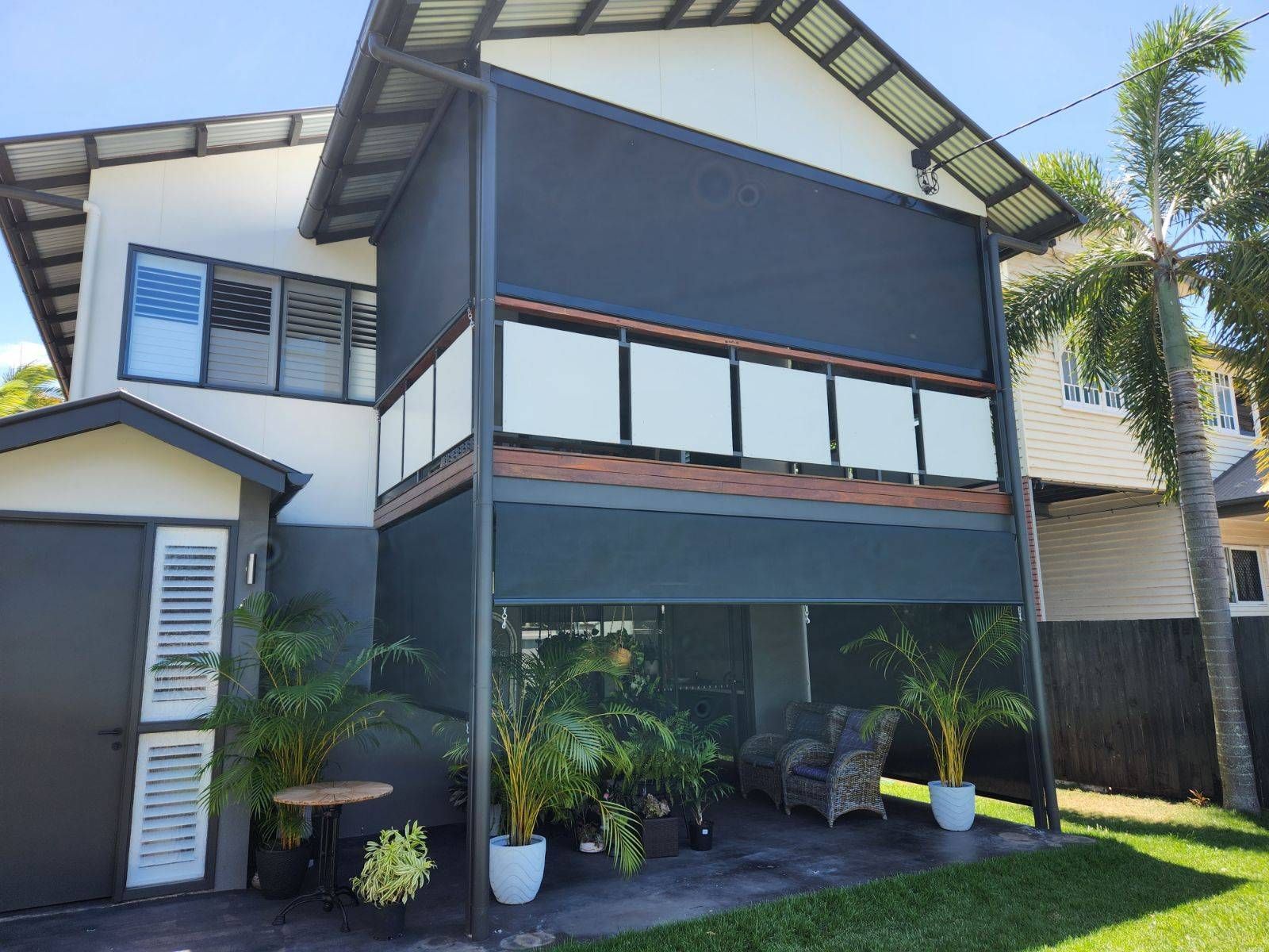 House With A Zipscreen And Garden Furniture Underneath — Tropical Shade Blinds in Brinsmead, QLD