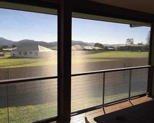 View of a Lake From a Balcony in a House — Tropical Shade Blinds in Brinsmead, QLD