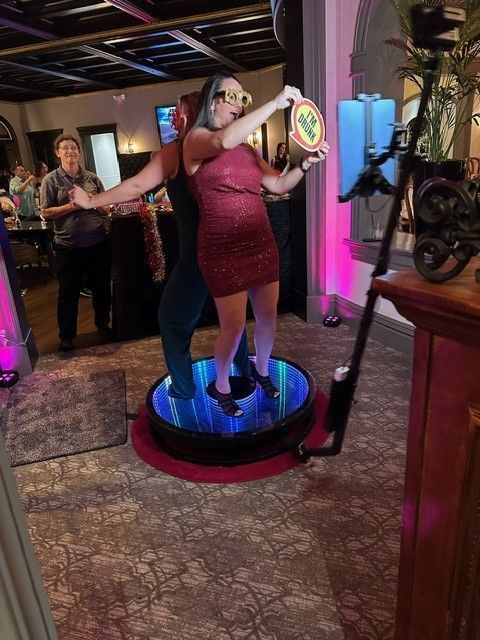guests enjoying a 360 photo booth 