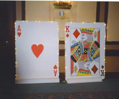 two playing cards with the ace of hearts and the king of diamonds