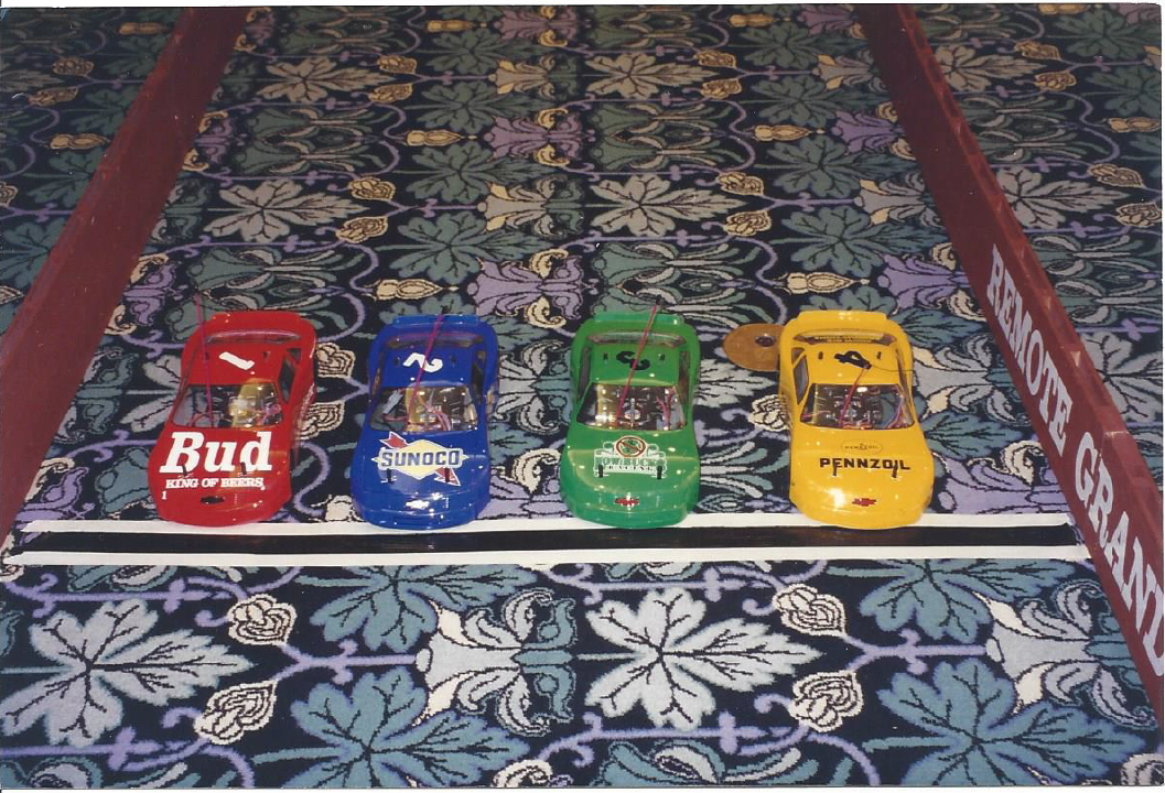 Remote control racers with race track 