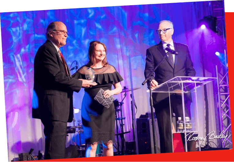 Steve Phillips accepting the award for best corporate party from NACE. 