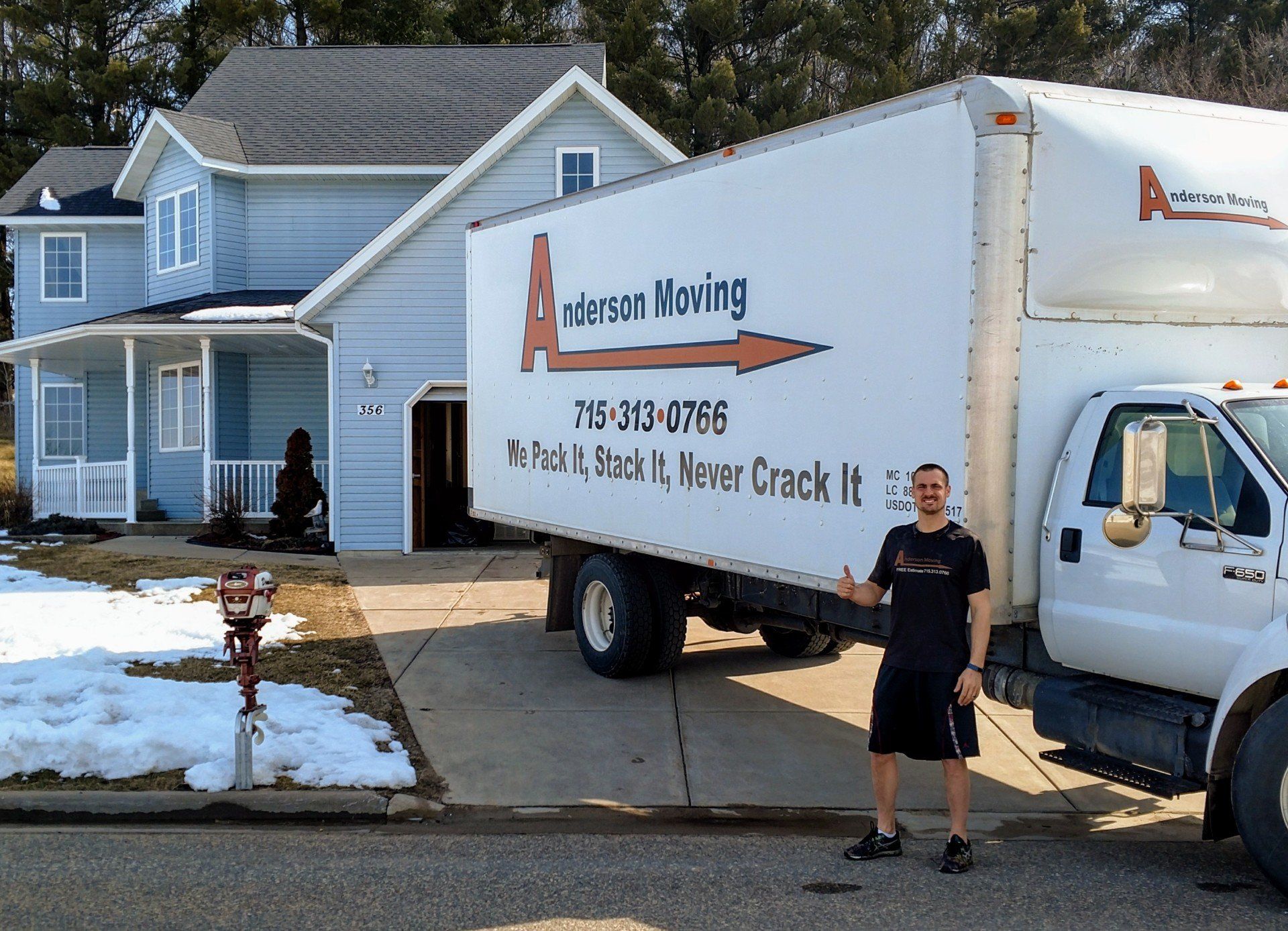 Man Behind Anderson White Truck — Eau Claire, WI — Anderson Moving
