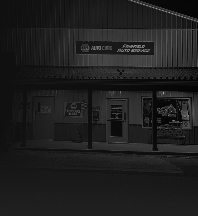 NAPA Auto Care repair shop building with sign above.