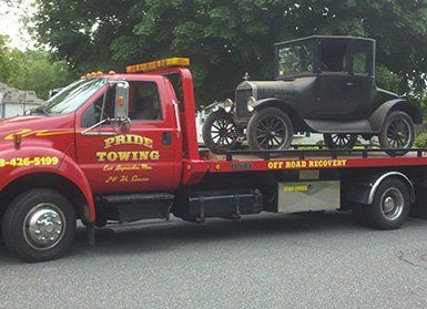Classic Car Towing — Truck Towing A Old Car in East Longmeadow, MA