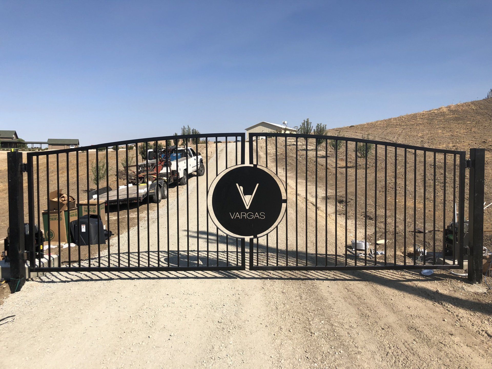 Image of Entry Gate with Custom Logo Cut out.