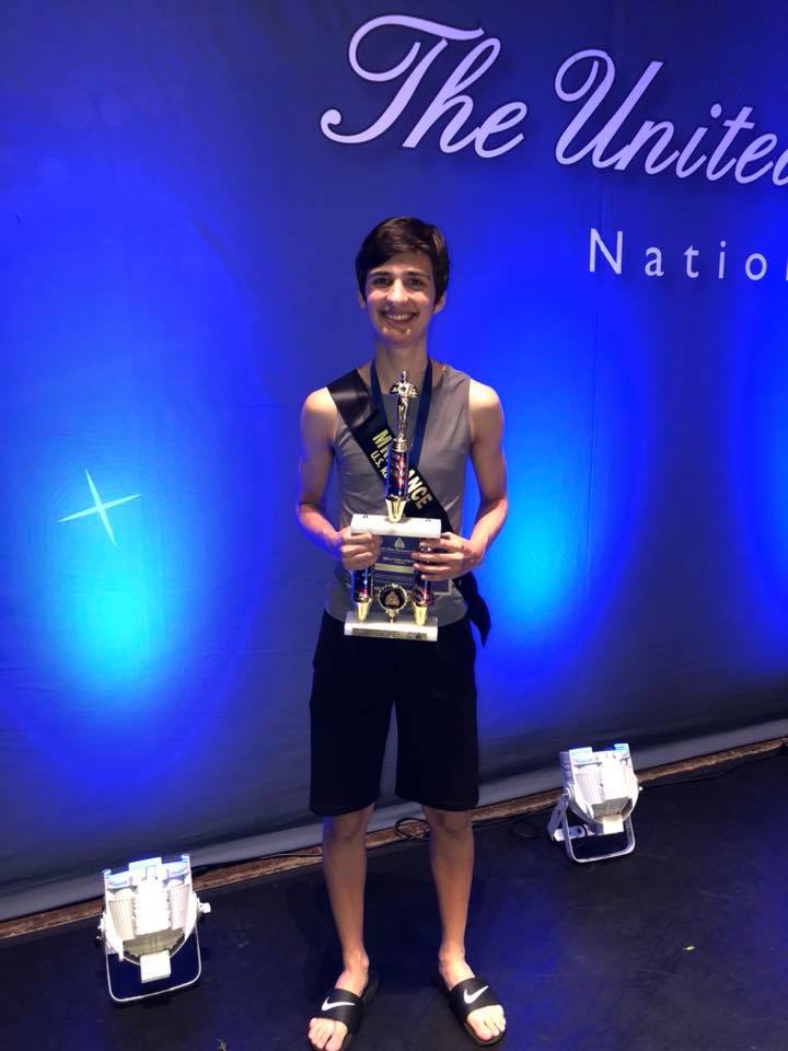 Dance Winner Holding A Trophy — Cicero, NY — CMC Dance Company