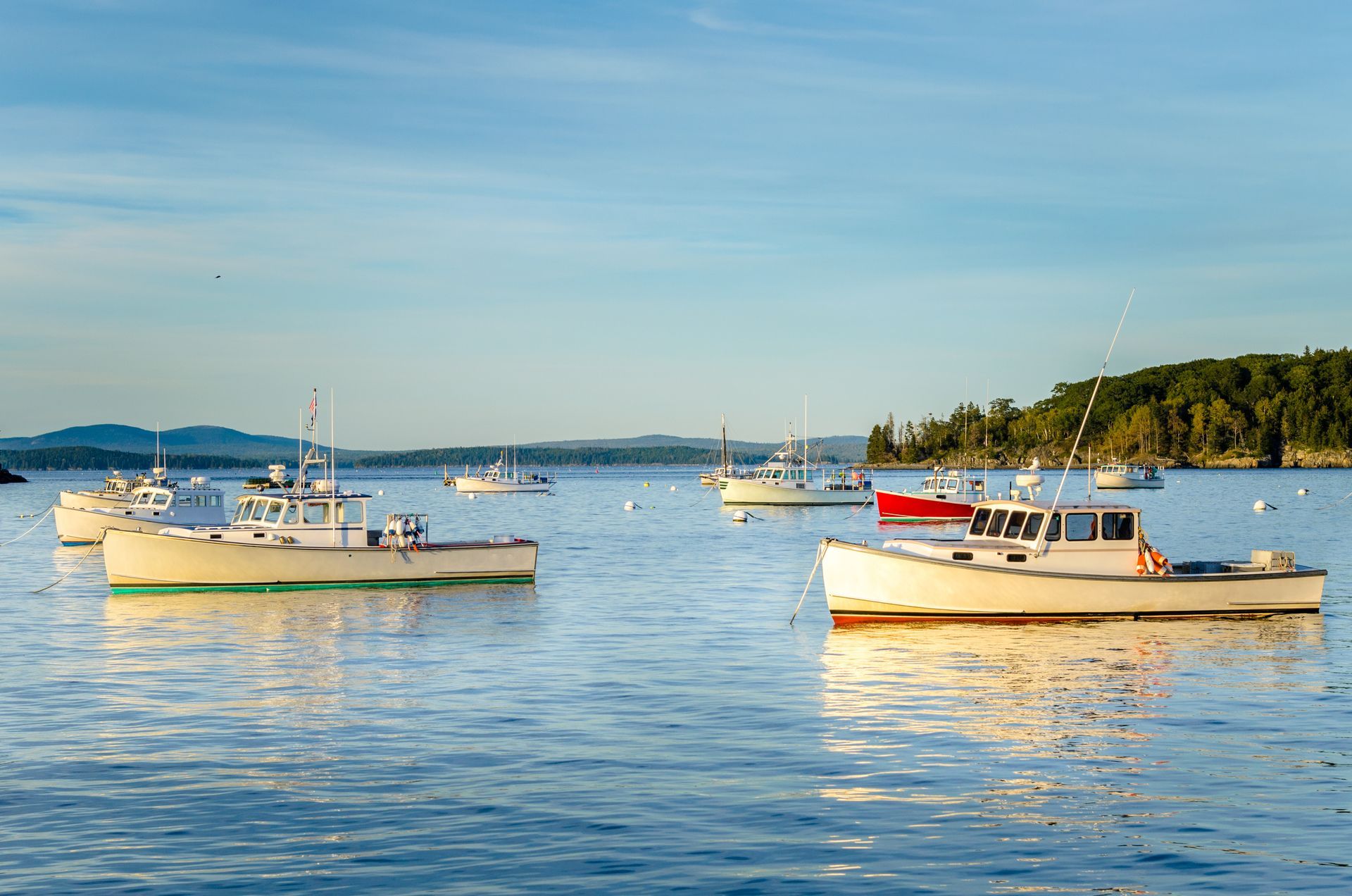 A boat is docked at a dock in the water.