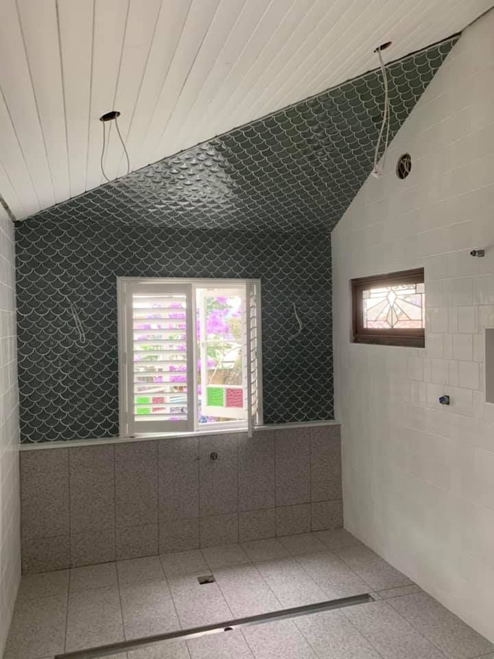 A Bathroom With a Window and a Tiled Floor — ASpect Wall & Floor Tiling in Tuncurry, NSW