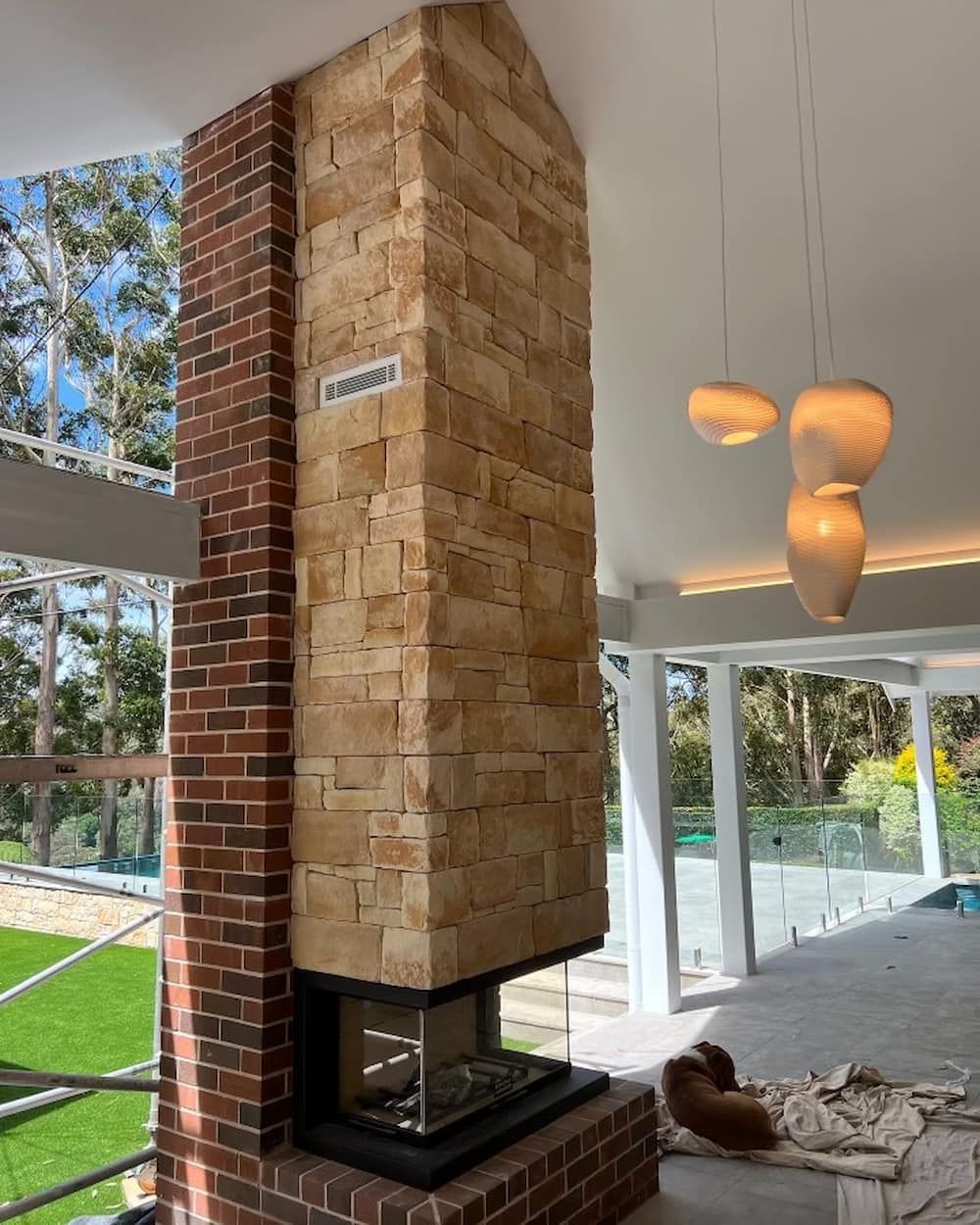 There Is A Fireplace In The Middle Of The Room — ASpect Wall & Floor Tiling in Forster, NSW