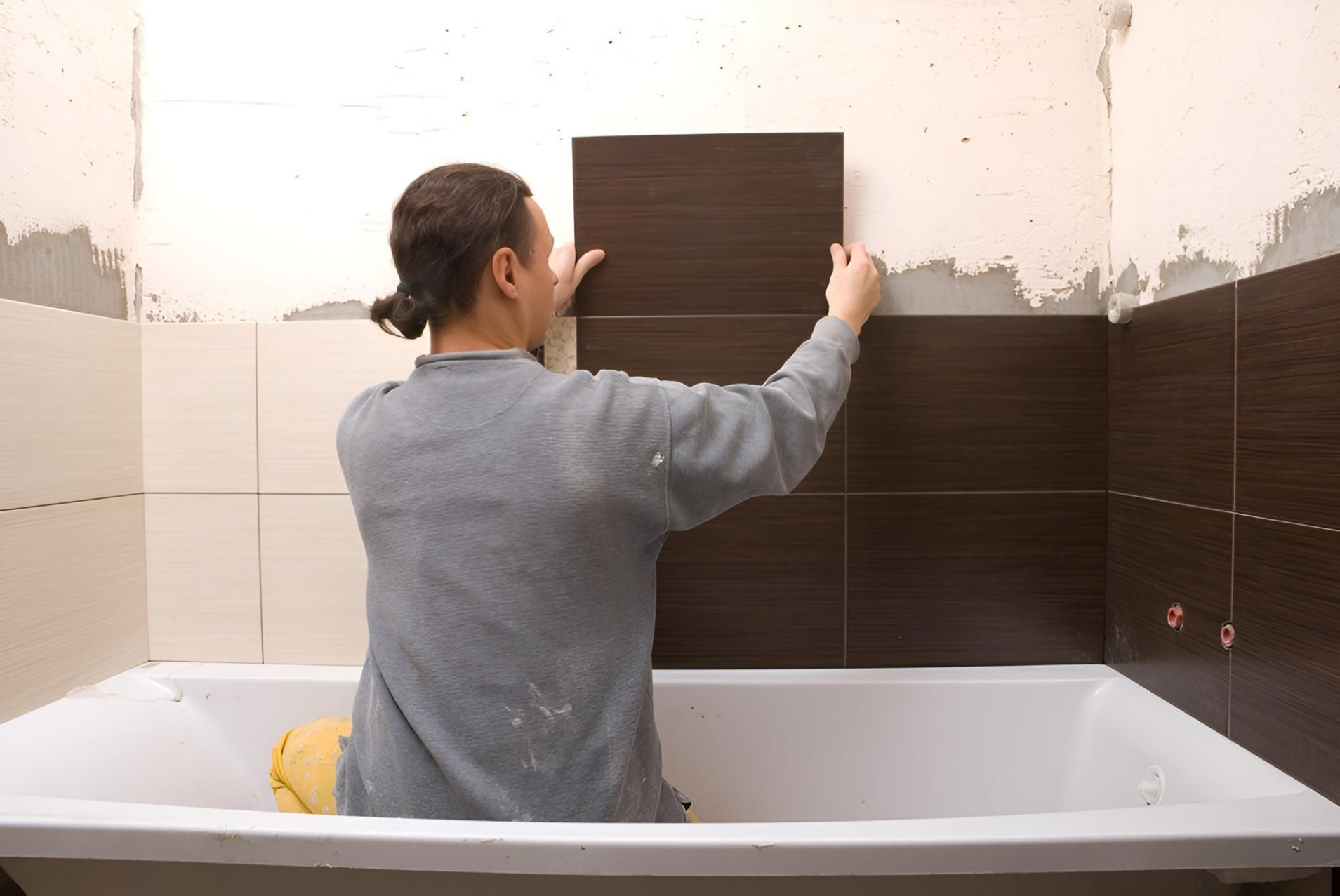 Man Tiling a Bathroom Wall — ASpect Wall & Floor Tiling in Port Macquarie, NSW