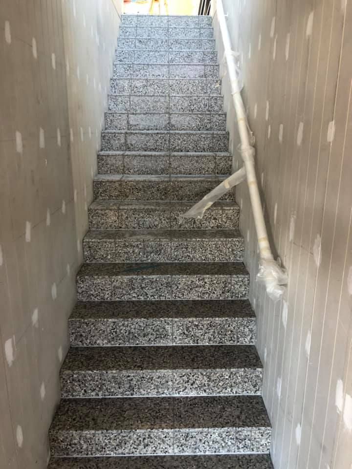 A Set of Stairs Leading Up to the Second Floor of a Building — ASpect Wall & Floor Tiling in Sydney, NSW