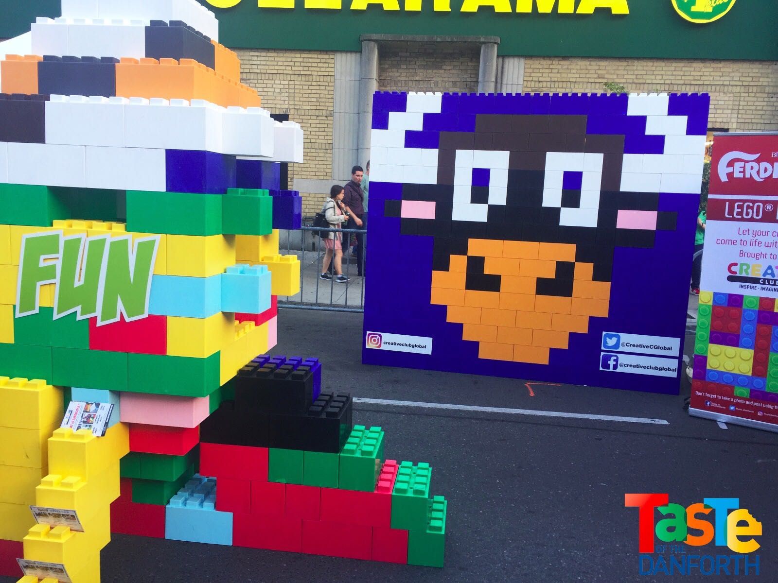 A bunch of colorful plastic blocks are stacked on top of each other on a white background.