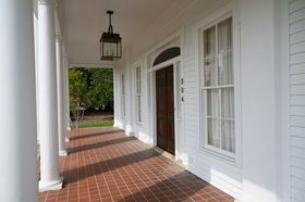 The Big House photo of the front porch.