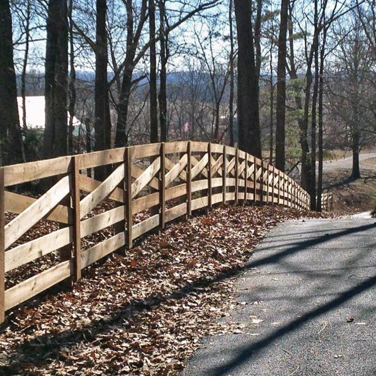 Fence With Trees And Dry Leaves — Shelbyville, KY — Shuck Fence Company