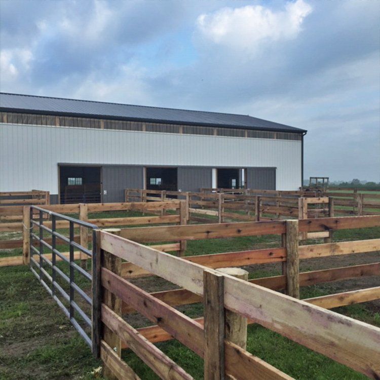 Wood Fence With A Black Gate — Shelbyville, KY — Shuck Fence Company