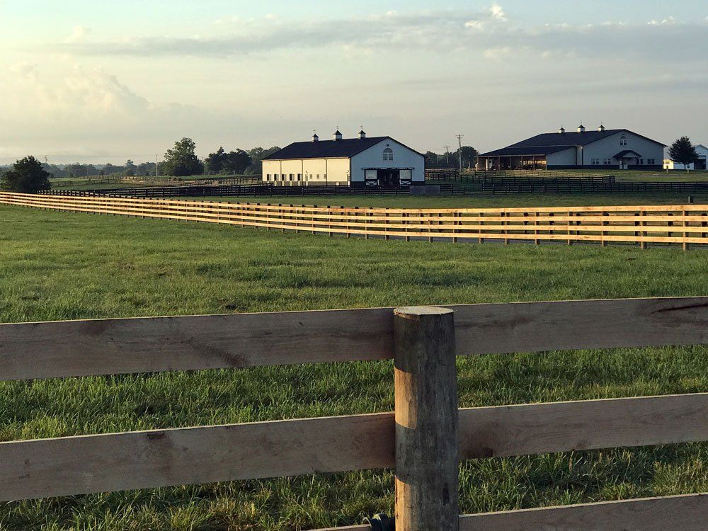 Wooden Fence In A Farm — Shelbyville, KY — Shuck Fence Company