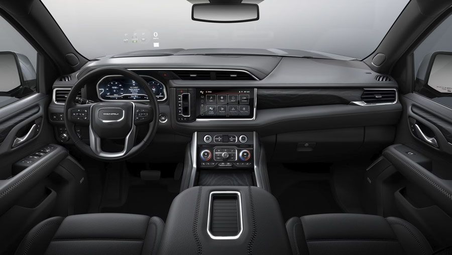 The interior of a gmc yukon is shown in black and white.