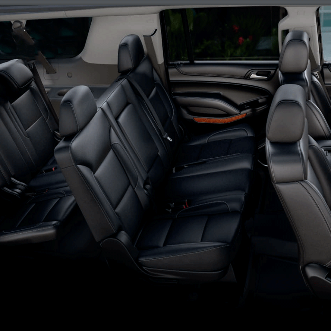 The inside of a car with black leather seats