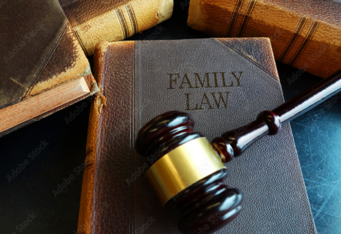 Family law book with a judge's gavel, symbolizing family law attorney services