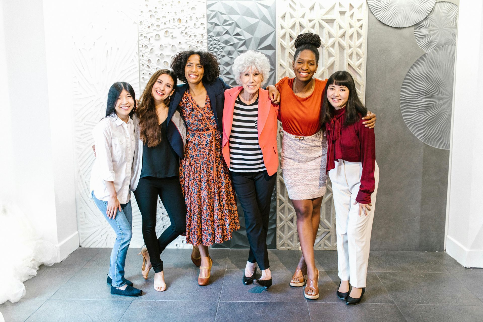 A team of beauty and wellness professionals collaborating and working together in the salon at Luxe Cosmetic Studios