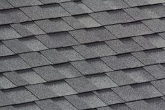 A close up of a roof with shingles on it.