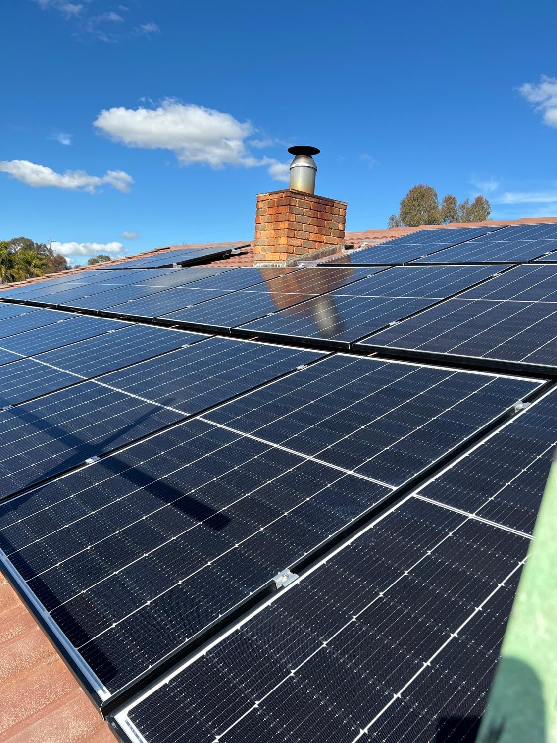 Solar Panels On A The Roof Of A House — Des Mullins Electrical & Solar In Wagga Wagga, NSW