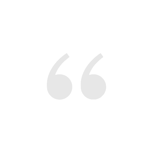 A gray quote icon on a transparent background