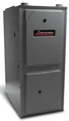 Prevett Heating and Cooling |A gray furnace is sitting on top of a white surface.