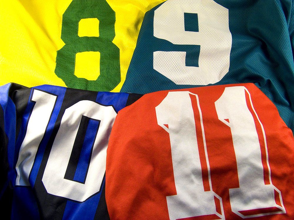 Photo Of The Four Different Sports Uniform — Screen Printing In Lismore, NSW