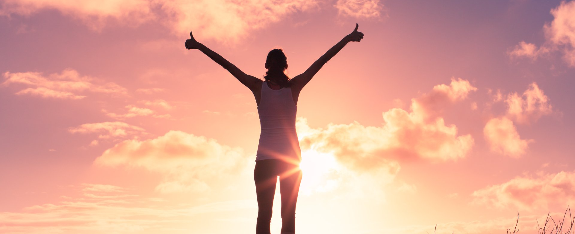 Young lady rising hands thumbs up