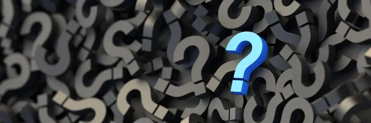 Blue question mark against a background of gray question marks.
