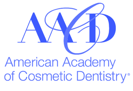 The logo for the american academy of cosmetic dentistry