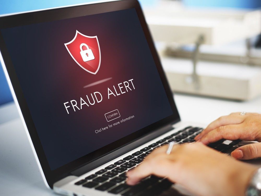 Laptop Screen Displaying Fraud Alert with A Shield Icon — Oz Data Tech in Taree, NSW
