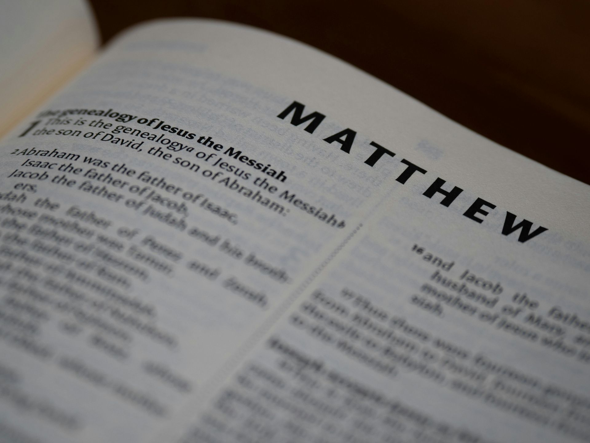 A picture of the Bible, open to the Gospel of Matthew. 