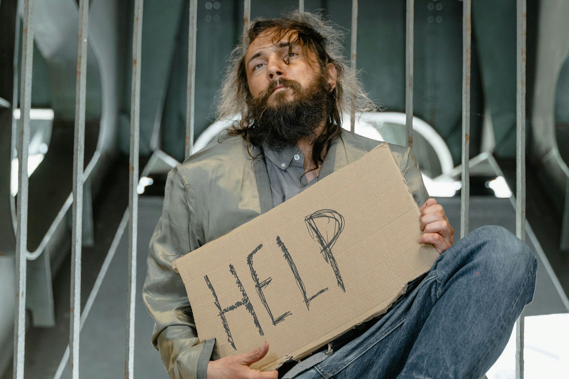 A lame man, begging for help, which is a picture of our spiritual helplessness.
