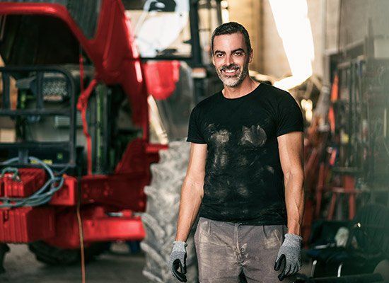 Happy Clutch Repair Worker