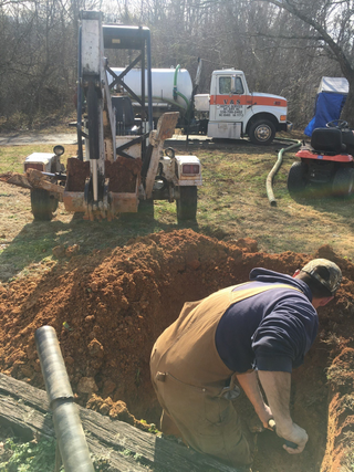 Installing  the Septic on the Backyard — Mount Airy, NC — V & S Septic Service