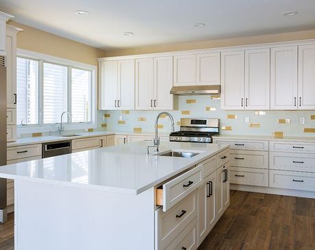 Kitchen Area With White Cabinets