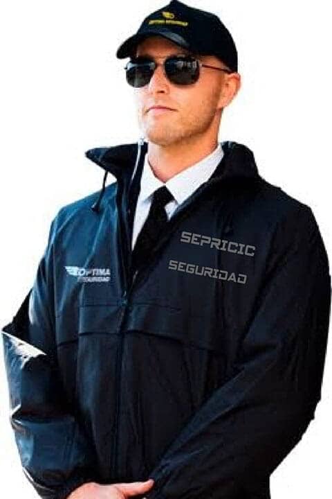 Un hombre con gafas de sol y una chaqueta que dice sepricic seguridad