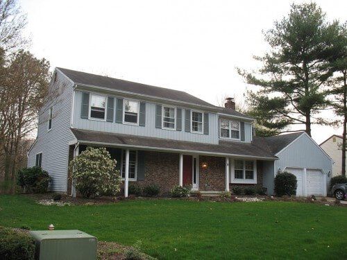 Modern House Before - Roof and siding located in Voorhees, NJ