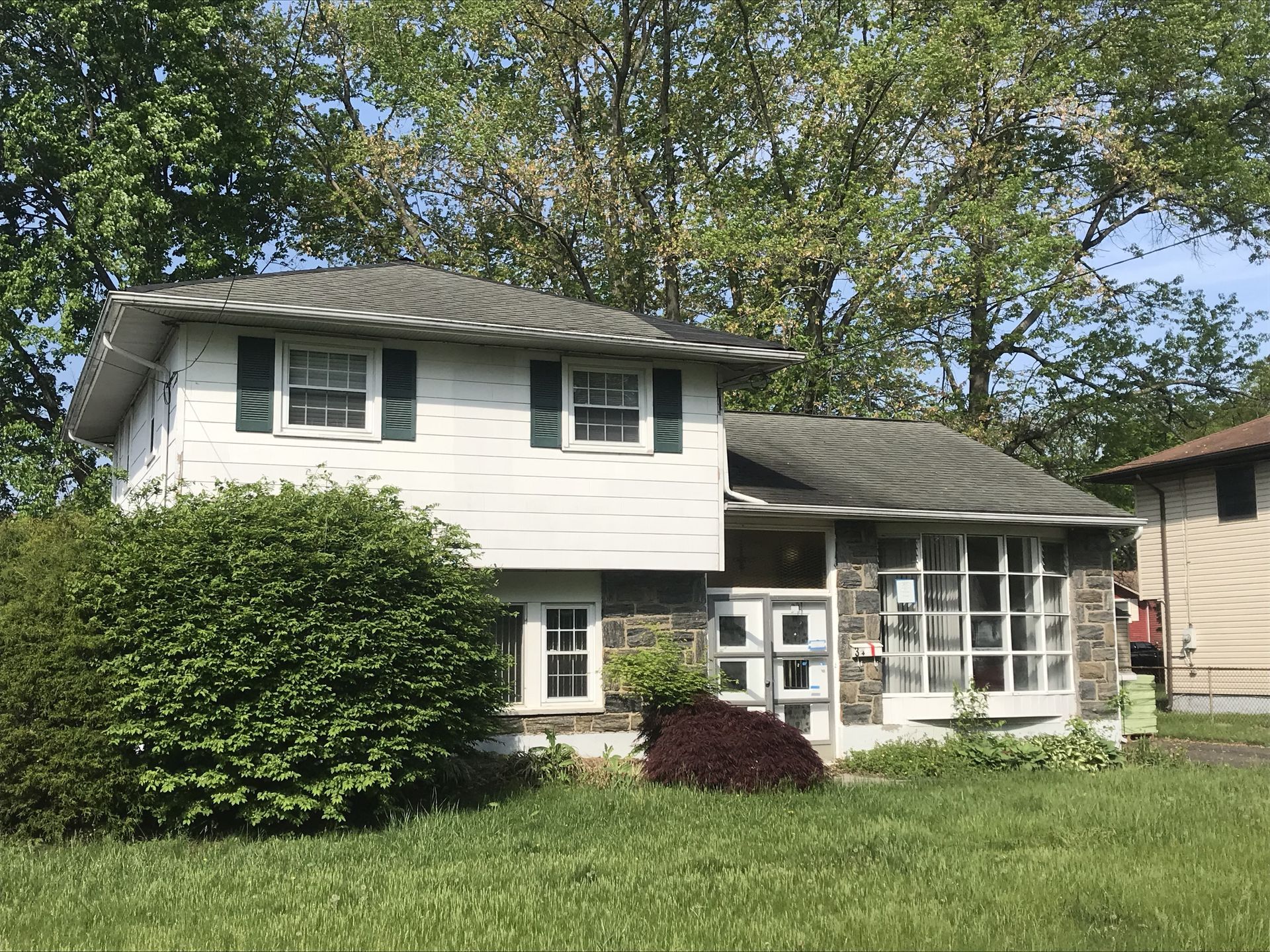 Old roof and siding on house located in Bellmawr, NJ