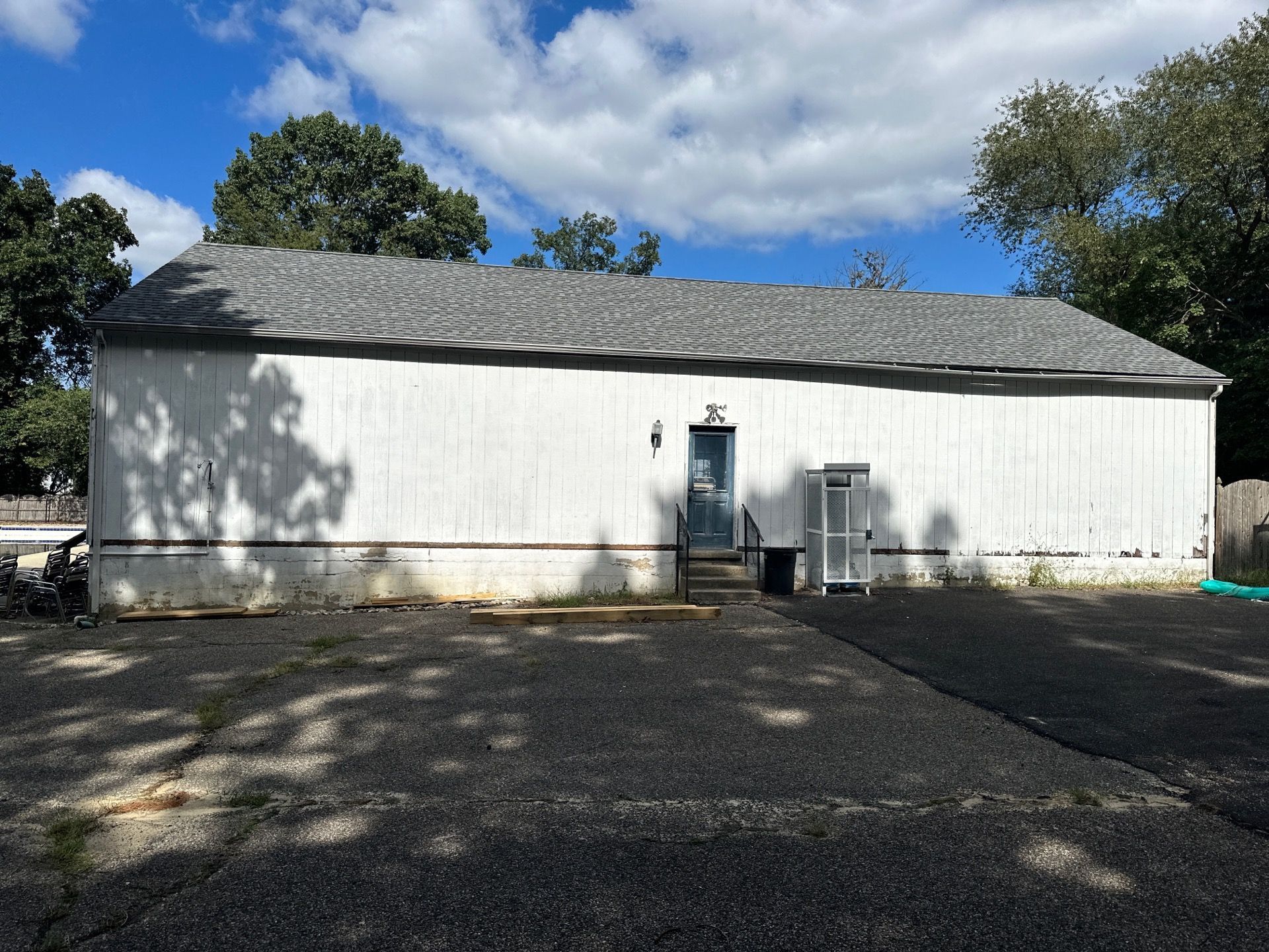 Old worn T-111 siding located in Cherry Hill, NJ