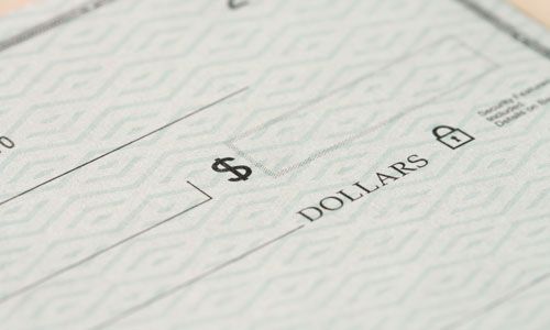 a close up of a check that says dollars on it