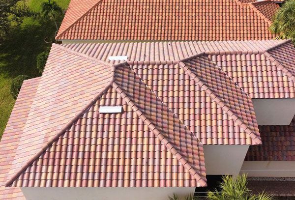 an aerial view of a house with a tiled roof