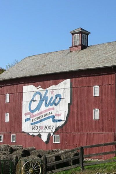 A red barn with the state of ohio painted on it