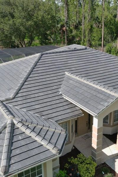 An aerial view of a house with a tiled roof