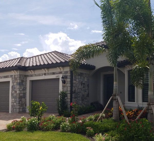 Brick house exterior roofing project completed by Allstate Exteriors and restorations in Fort Meyers, FL.