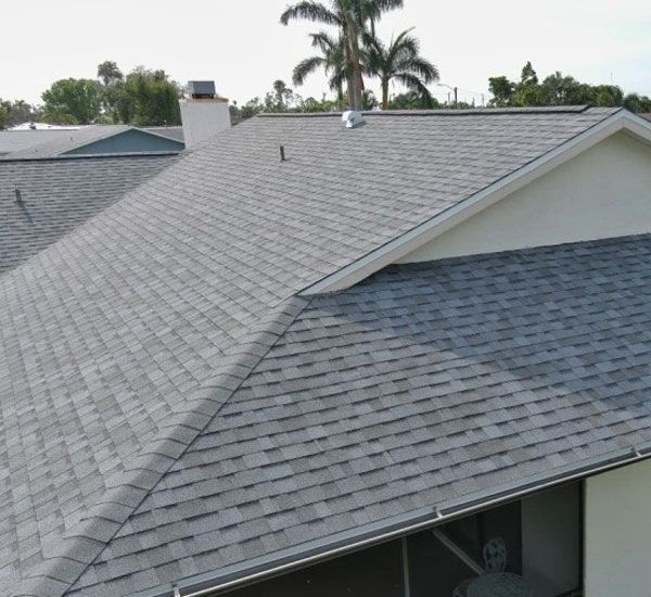 A house with a roof that has shingles on it