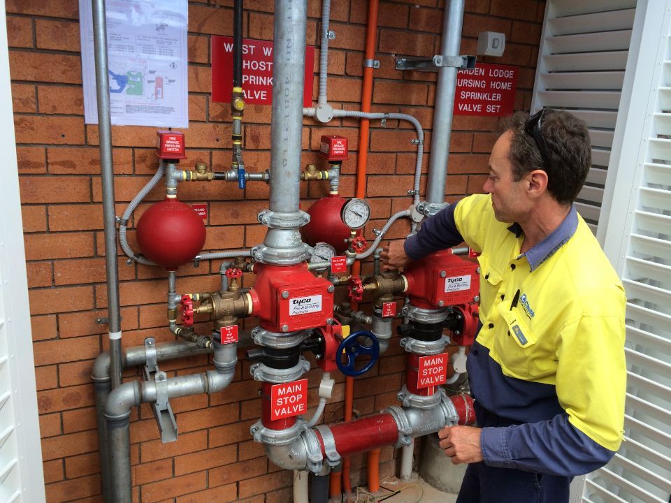 man turning the valve off